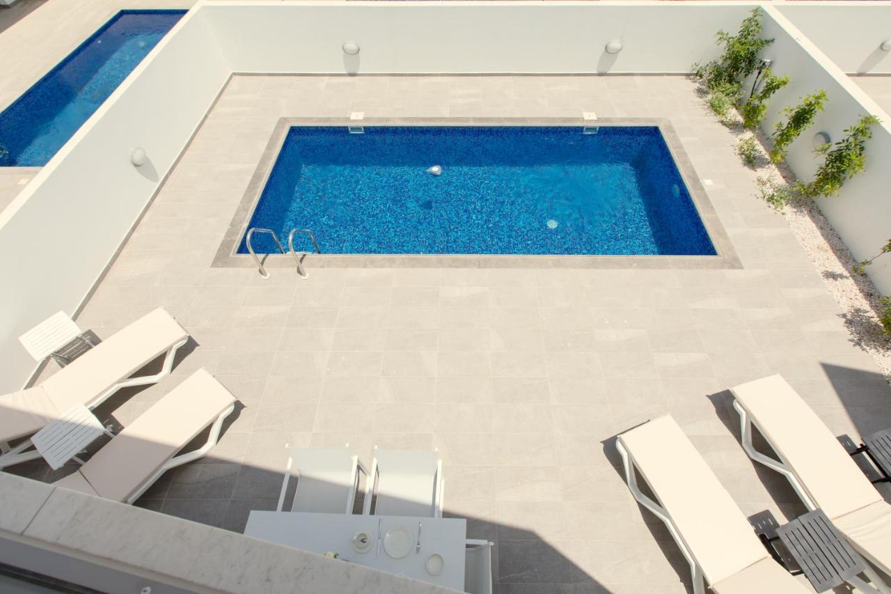 Palm Tree Villas Livadhia Екстер'єр фото
