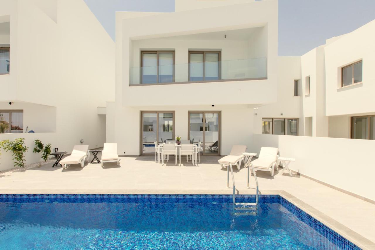 Palm Tree Villas Livadhia Екстер'єр фото