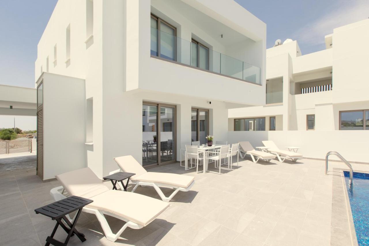 Palm Tree Villas Livadhia Екстер'єр фото